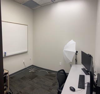 Recording Studio with computer and whiteboard